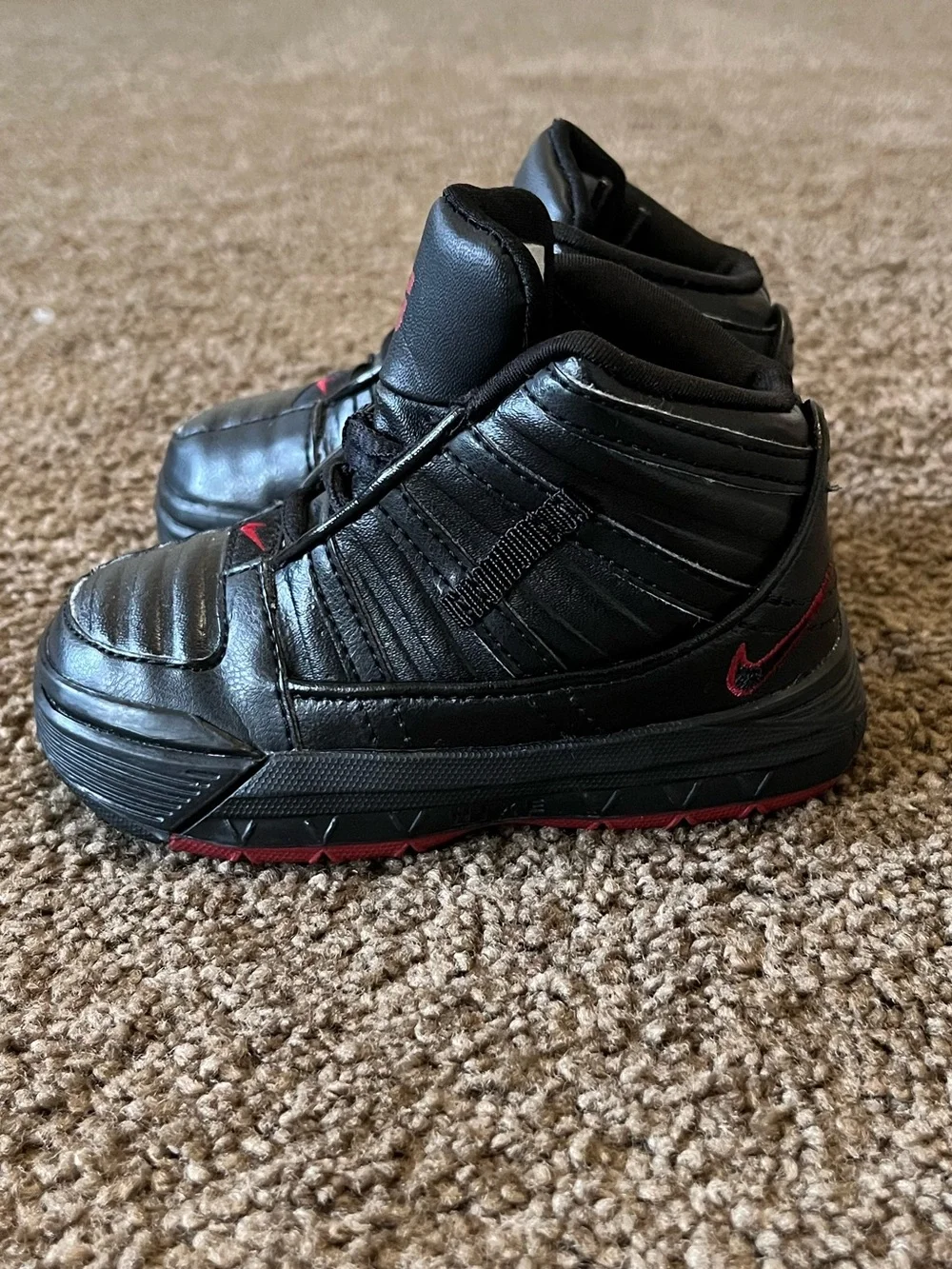 Nike Black Sneakers with Red Accents